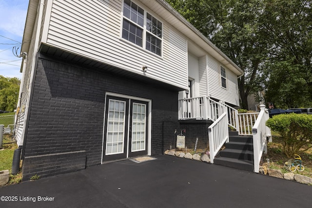 1108 Palisades Dr, Frankfort, KY 40601 - view of side of property featuring brick siding and a patio area