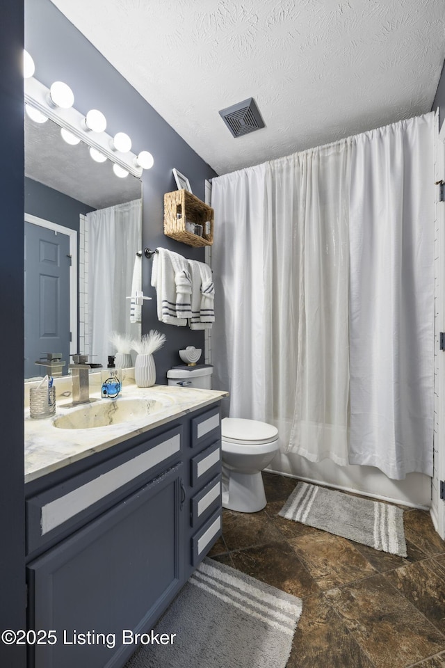 1108 Palisades Dr, Frankfort, KY 40601 - bathroom with vanity, stone finish floors, a textured ceiling, and shower / bath combo