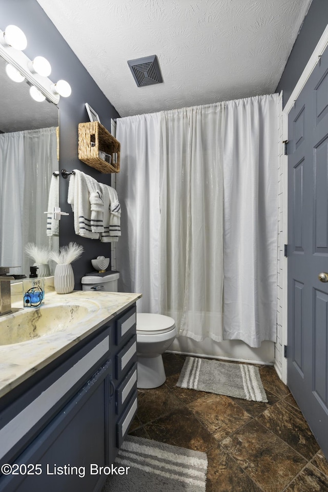 1108 Palisades Dr, Frankfort, KY 40601 - bathroom with vanity, stone finish flooring, a textured ceiling, and shower / bath combination with curtain