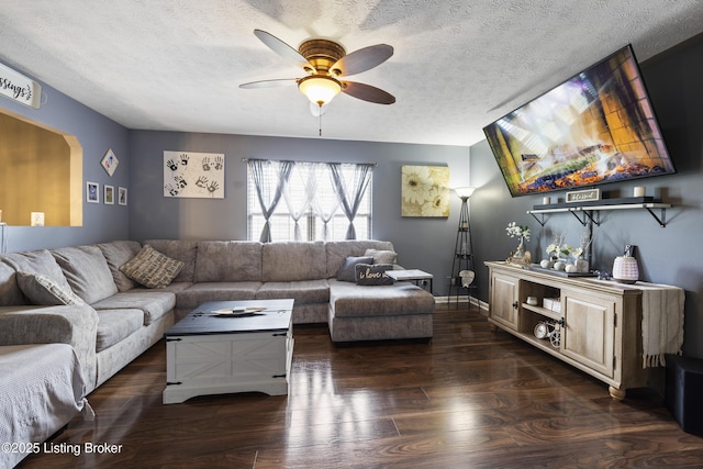 1108 Palisades Dr, Frankfort, KY 40601 - living room featuring wood finished floors, ceiling fan, a textured ceiling, and arched walkways