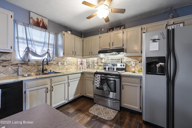 1108 Palisades Dr, Frankfort, KY 40601 - kitchen with appliances with stainless steel finishes, under cabinet range hood, light countertops, a ceiling fan, and dark wood finished floors