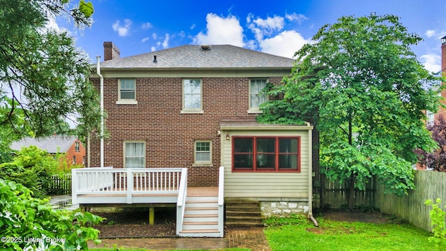 213 Barberry Ln, Lexington, KY 40503 - back of property with a wooden deck, a chimney, brick siding, and roof with shingles