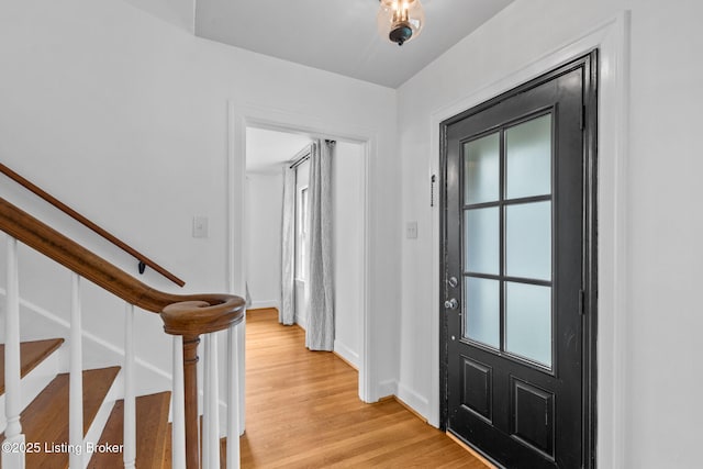 213 Barberry Ln, Lexington, KY 40503 - entryway featuring light wood-type flooring, stairway, and baseboards