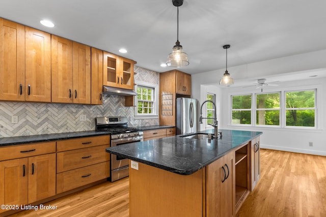 213 Barberry Ln, Lexington, KY 40503 - kitchen with stainless steel appliances, decorative backsplash, light wood-style floors, brown cabinets, and recessed lighting