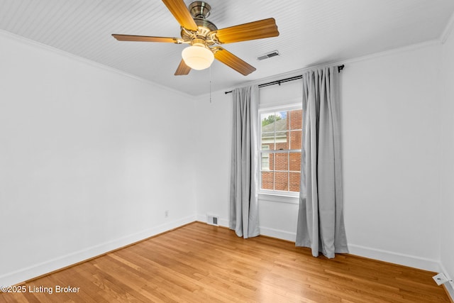 213 Barberry Ln, Lexington, KY 40503 - spare room with light wood finished floors, baseboards, ceiling fan, and crown molding