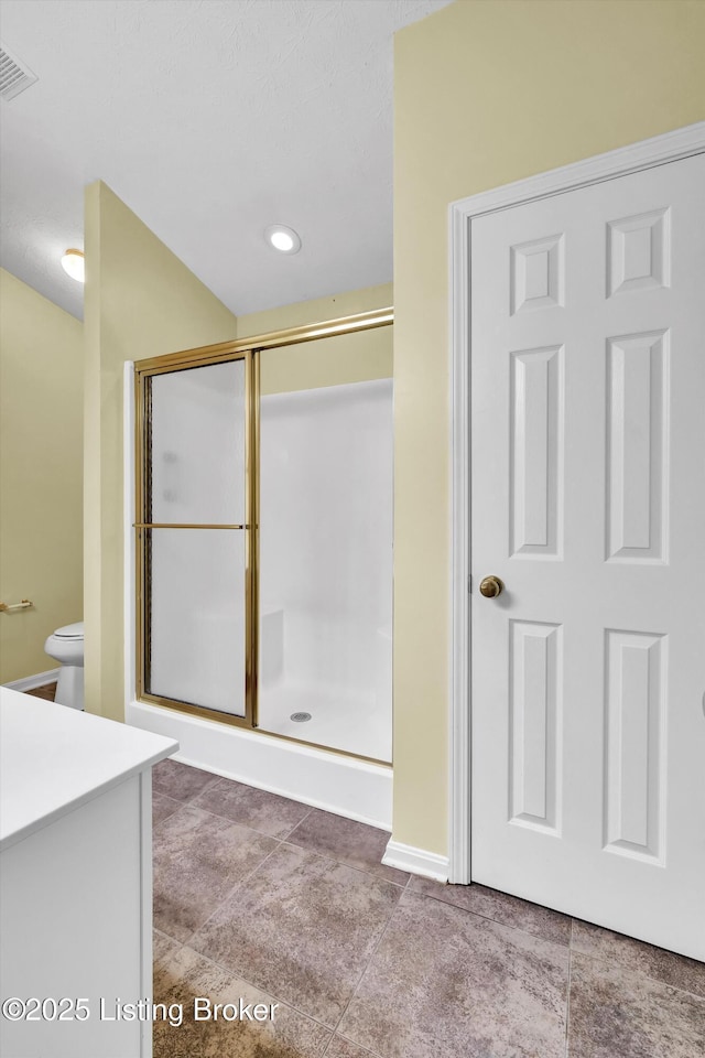 8405 Adams Run Rd, Louisville, KY 40228 - bathroom featuring a shower stall, vanity, and toilet