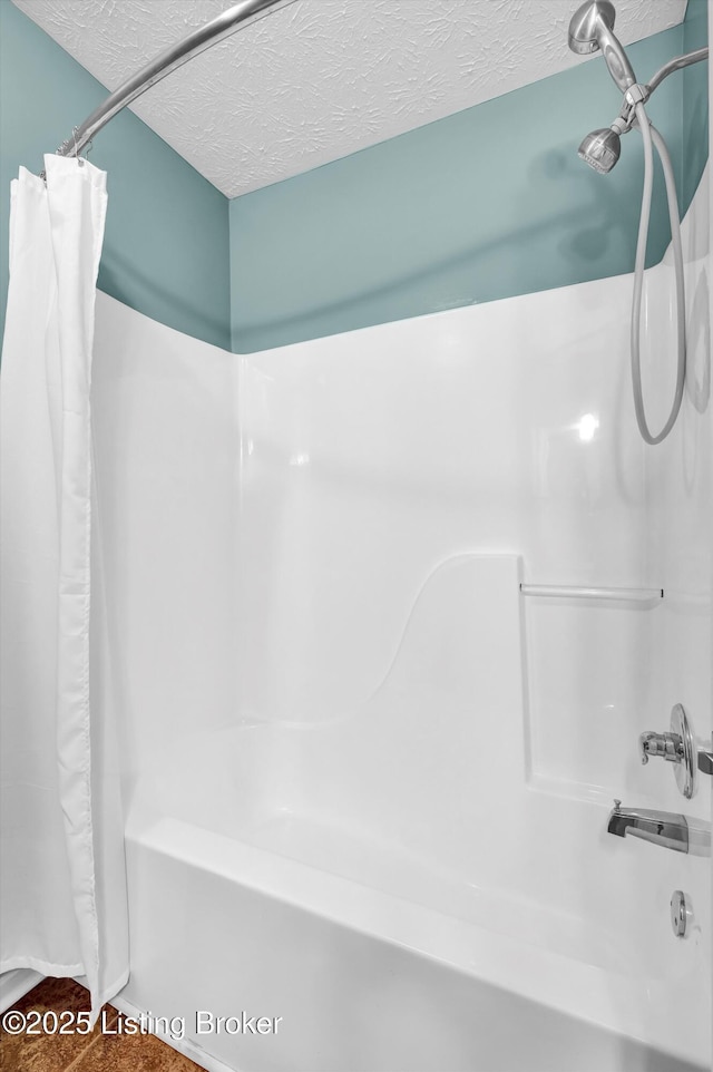 8405 Adams Run Rd, Louisville, KY 40228 - full bath with shower / bath combo and a textured ceiling