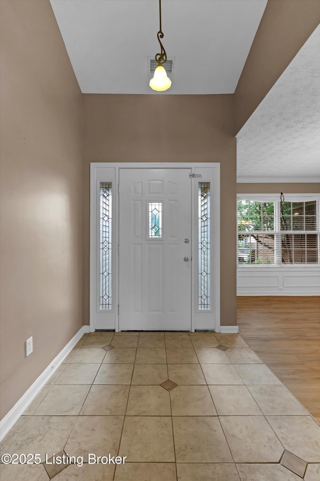 8405 Adams Run Rd, Louisville, KY 40228 - foyer entrance with light tile patterned floors and baseboards