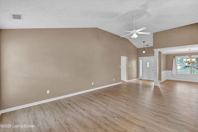 8405 Adams Run Rd, Louisville, KY 40228 - unfurnished living room with a chandelier, light wood-type flooring, a ceiling fan, high vaulted ceiling, and decorative columns