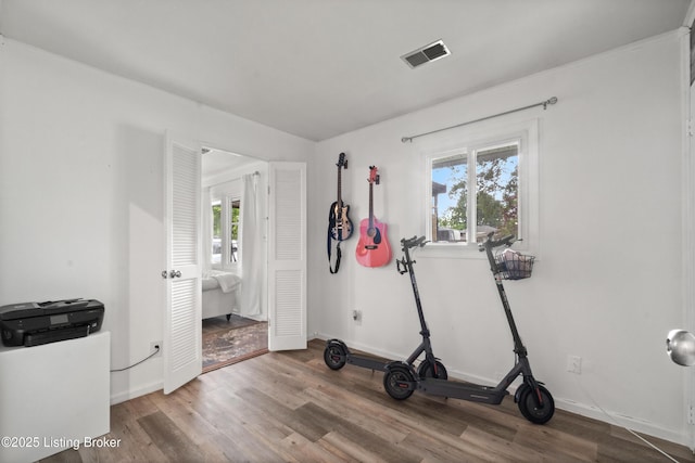 1709 Wickham Way, Louisville, KY 40223 - exercise area featuring wood finished floors and baseboards