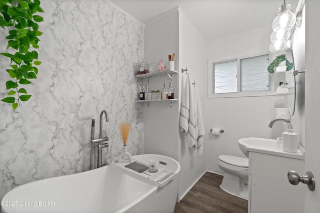 1709 Wickham Way, Louisville, KY 40223 - bathroom with vanity, a soaking tub, wood finished floors, crown molding, and toilet