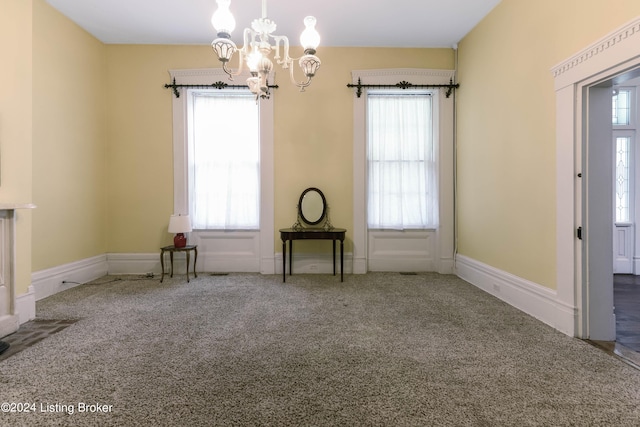 4893 N Preston Way, Shepherdsville, KY 40165 - spare room with carpet floors, a chandelier, healthy amount of natural light, and baseboards