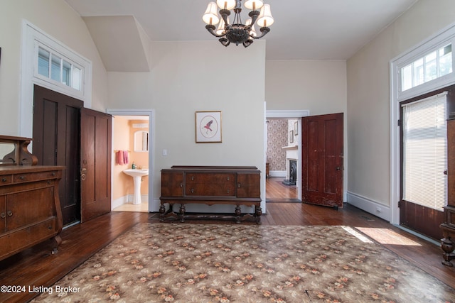 4893 N Preston Way, Shepherdsville, KY 40165 - foyer entrance with a chandelier, hardwood / wood-style floors, and baseboards