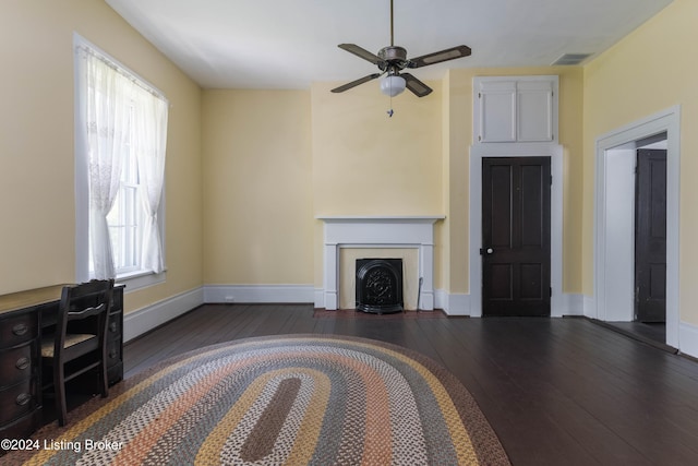 4893 N Preston Way, Shepherdsville, KY 40165 - unfurnished living room with hardwood / wood-style floors, healthy amount of natural light, a ceiling fan, and baseboards
