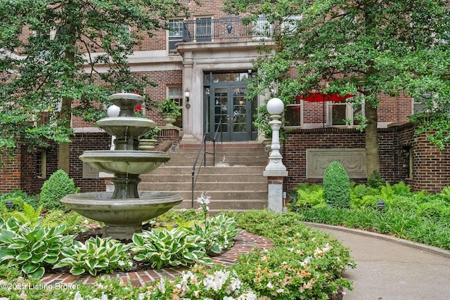 1412 Willow Ave Unit 56, Louisville, KY 40204 - property entrance featuring french doors and brick siding