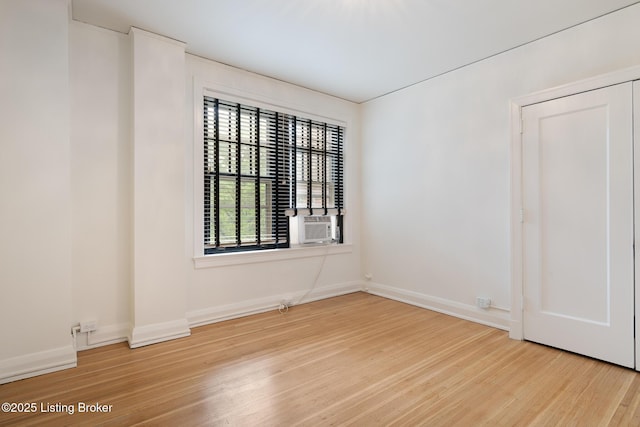 1412 Willow Ave Unit 56, Louisville, KY 40204 - unfurnished room featuring wood finished floors and cooling unit