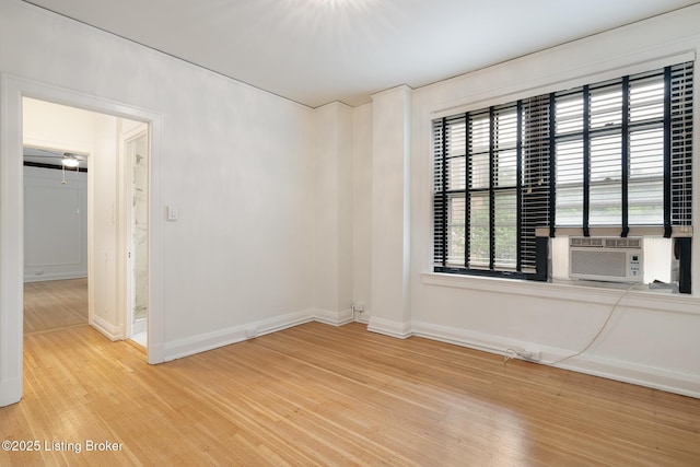 1412 Willow Ave Unit 56, Louisville, KY 40204 - empty room featuring light wood-style flooring and cooling unit
