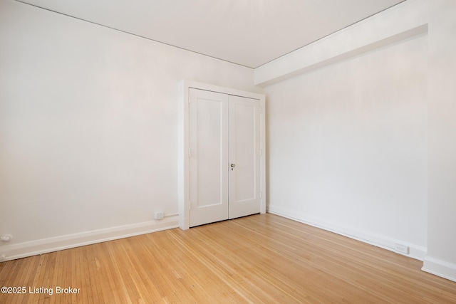 1412 Willow Ave Unit 56, Louisville, KY 40204 - unfurnished bedroom featuring light wood-style flooring and a closet