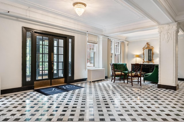 1412 Willow Ave Unit 56, Louisville, KY 40204 - foyer entrance featuring ornamental molding, decorative columns, and radiator heating unit
