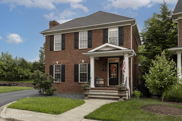895 Woodlawn Rd Unit 3, Bardstown, KY 40004 - georgian-style home with a chimney, brick siding, a shingled roof, and a front yard