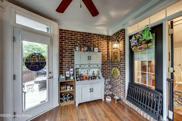 895 Woodlawn Rd Unit 3, Bardstown, KY 40004 - bar with a ceiling fan, wood finished floors, and brick wall