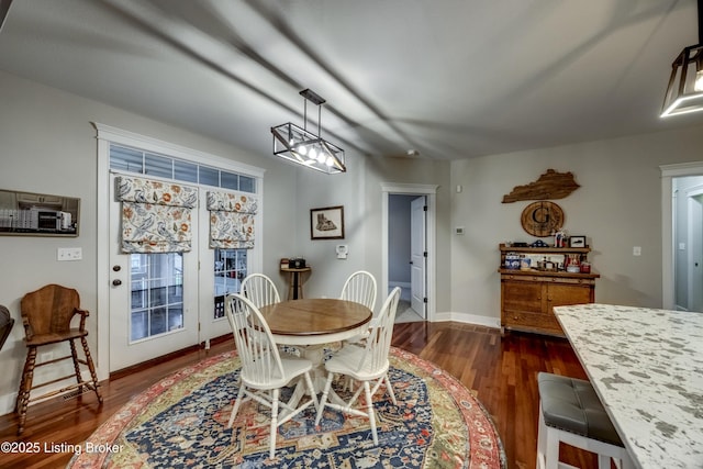 895 Woodlawn Rd Unit 3, Bardstown, KY 40004 - dining area with dark wood-style floors and baseboards