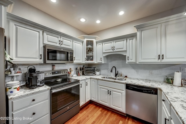 895 Woodlawn Rd Unit 3, Bardstown, KY 40004 - kitchen featuring stainless steel appliances, a sink, tasteful backsplash, light wood finished floors, and recessed lighting