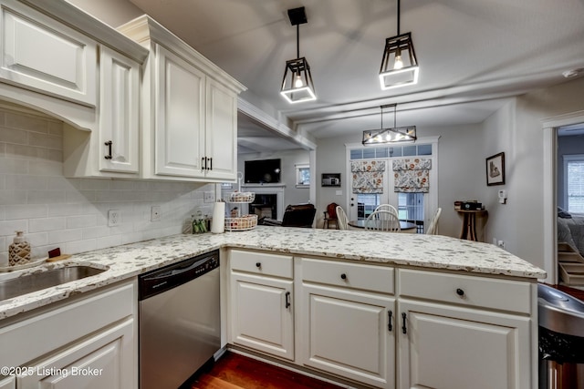 895 Woodlawn Rd Unit 3, Bardstown, KY 40004 - kitchen with dishwasher, a fireplace, tasteful backsplash, a peninsula, and white cabinets