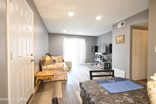 7050 Wildwood Cir Unit 100, Louisville, KY 40291 - living area with wood finished floors and recessed lighting