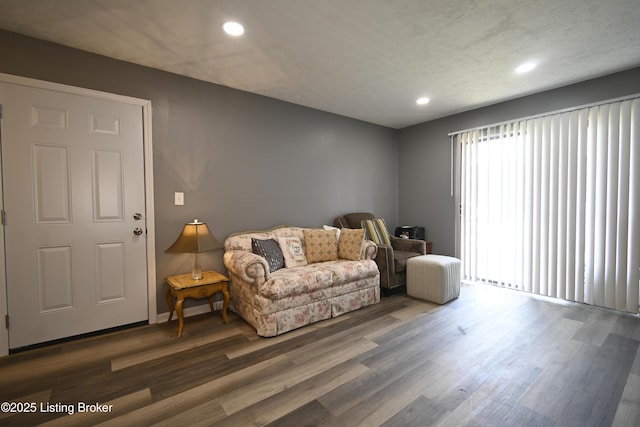 7050 Wildwood Cir Unit 100, Louisville, KY 40291 - living area with wood finished floors and recessed lighting