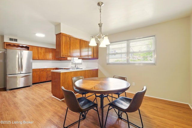 1212 Hibiscus Dr, Clarksville, IN 47129 - dining area with light wood-style flooring