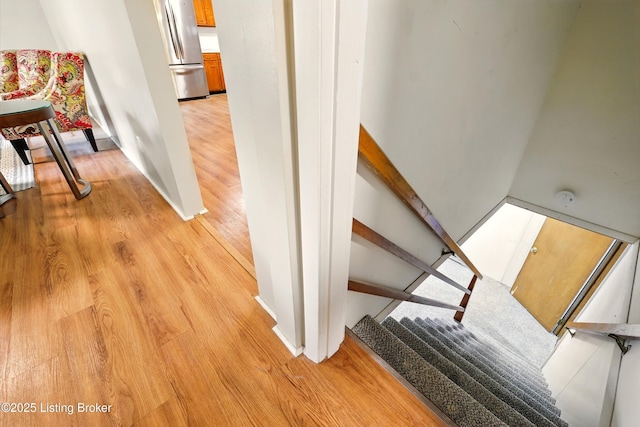 1212 Hibiscus Dr, Clarksville, IN 47129 - stairway with wood finished floors and baseboards