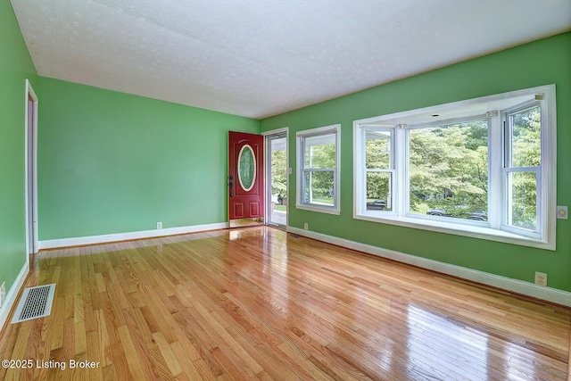 3116 Osprey Rd, Louisville, KY 40213 - spare room with light wood-style floors and a textured ceiling