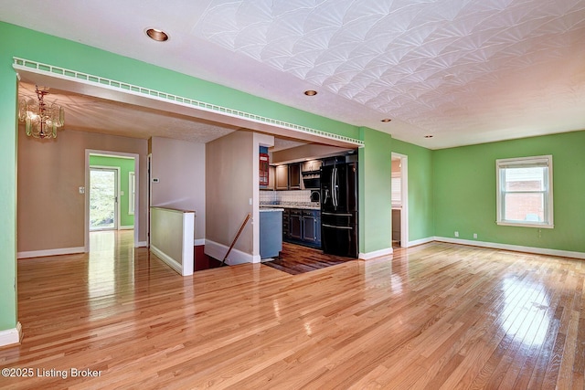 3116 Osprey Rd, Louisville, KY 40213 - unfurnished living room with light wood-style floors, an ornate ceiling, and recessed lighting