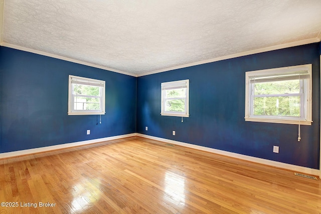 3116 Osprey Rd, Louisville, KY 40213 - spare room featuring hardwood / wood-style floors, a textured ceiling, and ornamental molding