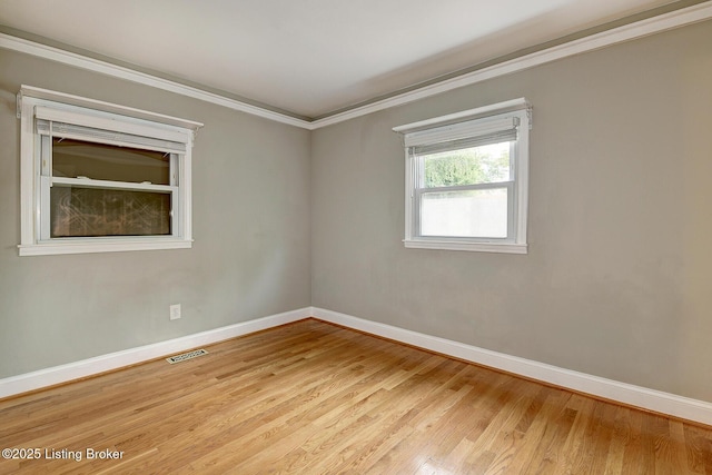3116 Osprey Rd, Louisville, KY 40213 - unfurnished room with light wood finished floors and crown molding