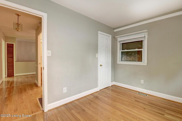 3116 Osprey Rd, Louisville, KY 40213 - empty room with light wood-style floors and baseboards