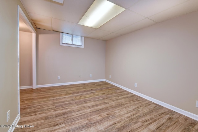 3116 Osprey Rd, Louisville, KY 40213 - basement featuring a drop ceiling and light wood-type flooring