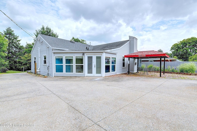 3116 Osprey Rd, Louisville, KY 40213 - back of house with french doors, roof with shingles, and a patio