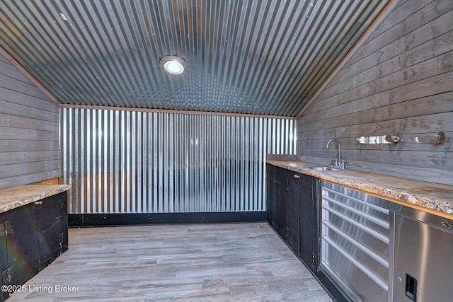 3116 Osprey Rd, Louisville, KY 40213 - bar area featuring vaulted ceiling, wood walls, and light wood-type flooring