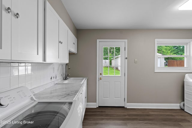 180 Valley Rd, Louisville, KY 40229 - laundry area featuring cabinet space, dark wood finished floors, washer and clothes dryer, and baseboards