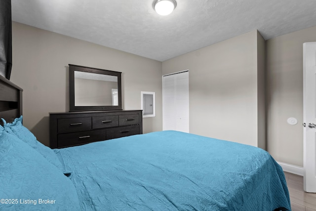180 Valley Rd, Louisville, KY 40229 - bedroom with wood finished floors and baseboards