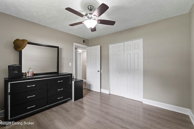 180 Valley Rd, Louisville, KY 40229 - bedroom featuring baseboards, wood finished floors, and a closet