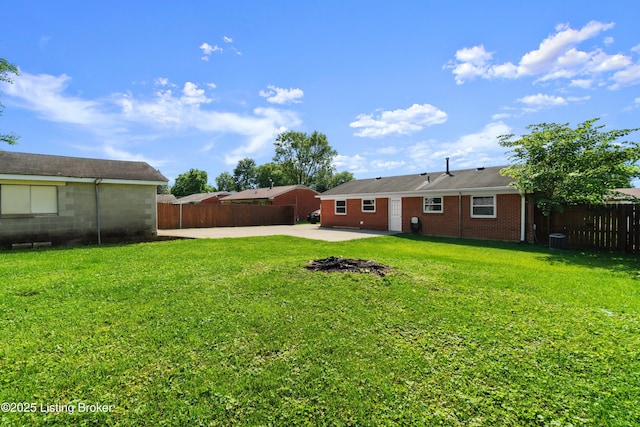 180 Valley Rd, Louisville, KY 40229 - view of yard featuring a patio area and central AC unit