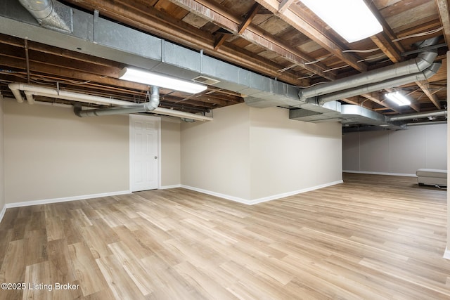11106 Beech Rd, Anchorage, KY 40223 - finished below grade area featuring baseboards and wood finished floors