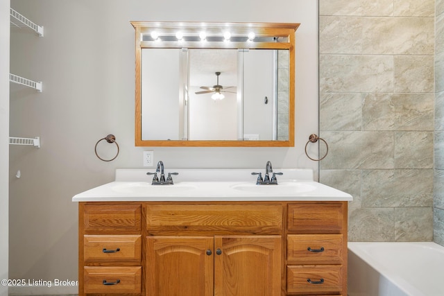 948 Samuel St, Louisville, KY 40204 - bathroom featuring double vanity, a ceiling fan, and shower / tub combination