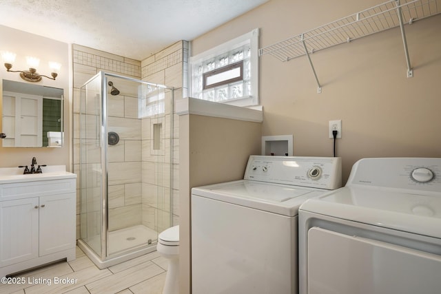 948 Samuel St, Louisville, KY 40204 - full bath with washing machine and dryer, a stall shower, and vanity