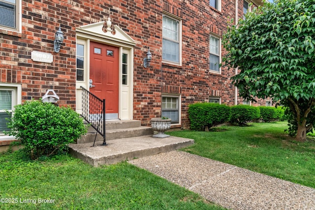 1007 Lake Pl Unit H11, Louisville, KY 40222 - property entrance with a yard and brick siding