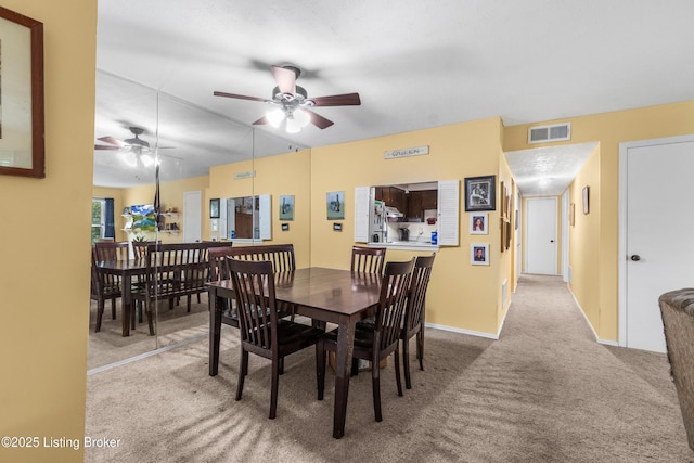 1007 Lake Pl Unit H11, Louisville, KY 40222 - carpeted dining room featuring a ceiling fan and baseboards