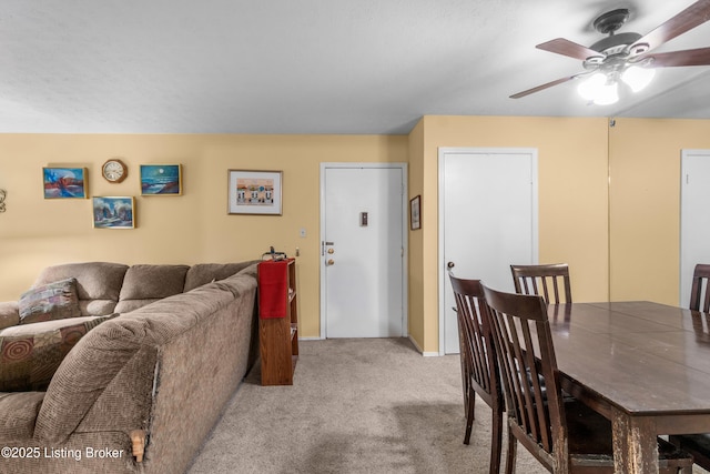 1007 Lake Pl Unit H11, Louisville, KY 40222 - dining area featuring light carpet and ceiling fan